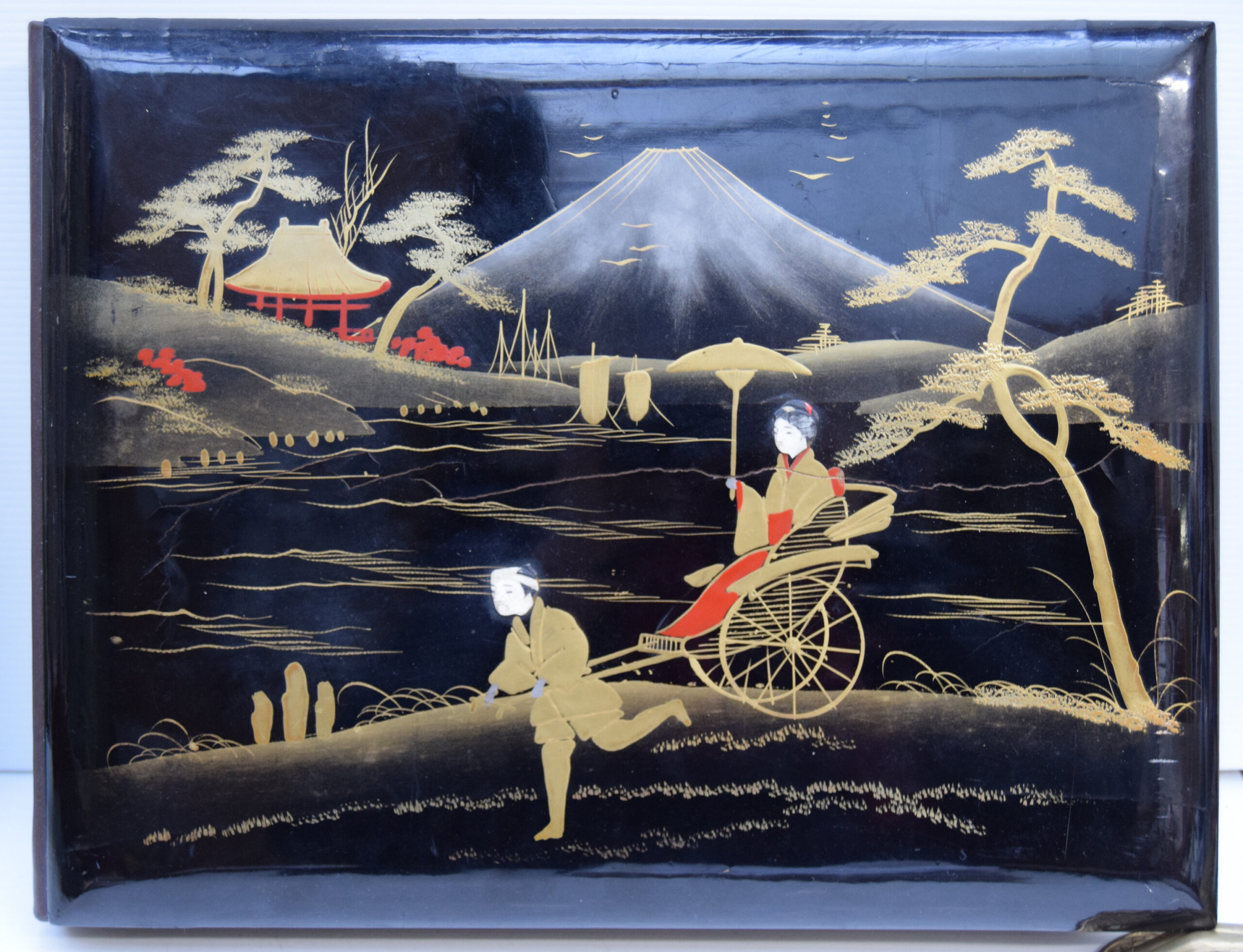 AN ATTRACTIVE PAINTED IVORY INLAYED LACQUERED ALBUM WITH 6 LEAVES CONTAINING 48 POSTCARDS.